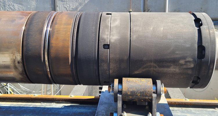 A section of the full-scale NaturaFrac tool on a work stand.